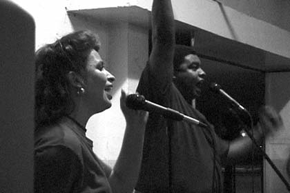 Jorge and Lorena preachingand singing